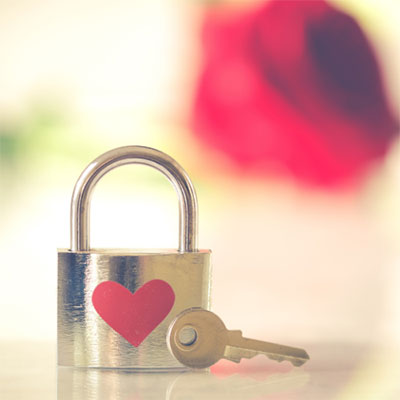 padlock with red heart shape on its front